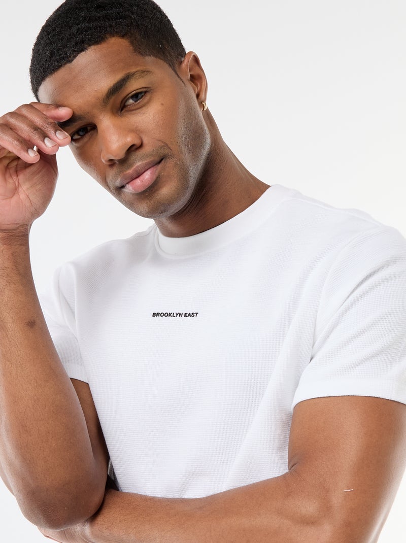 T-shirt in piqué di cotone a maniche corte Bianco - Kiabi
