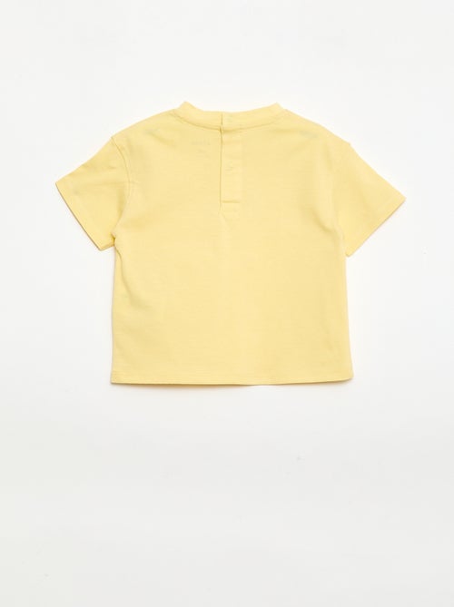 T-shirt uni avec fleurs fantaisies au col - Kiabi