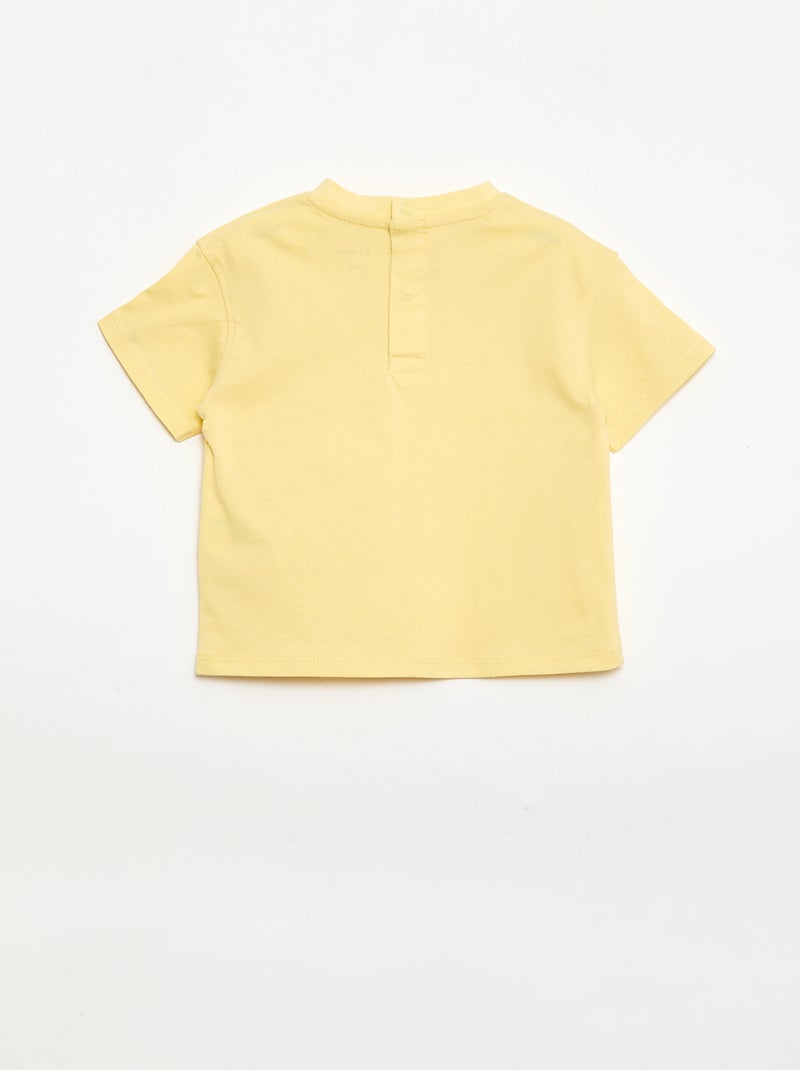 T-shirt uni avec fleurs fantaisies au col Jaune - Kiabi