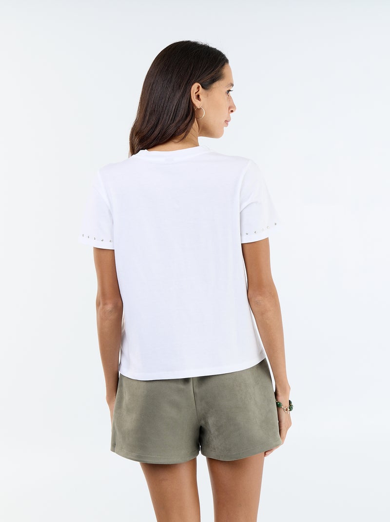 Tee-shirt en jersey avec clous au col et aux manches Blanc - Kiabi