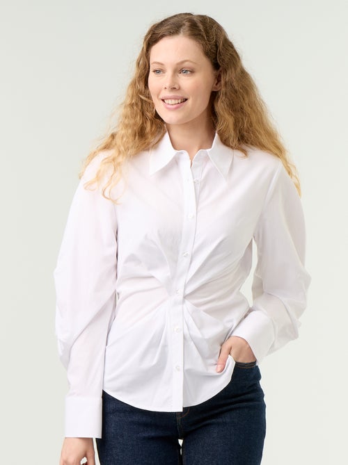 Trendige Bluse mit raffiniertem, vorne tailliertem Schnitt - Kiabi Trendige Bluse mit raffiniertem, vorne tailliertem Schnitt - Kiabi