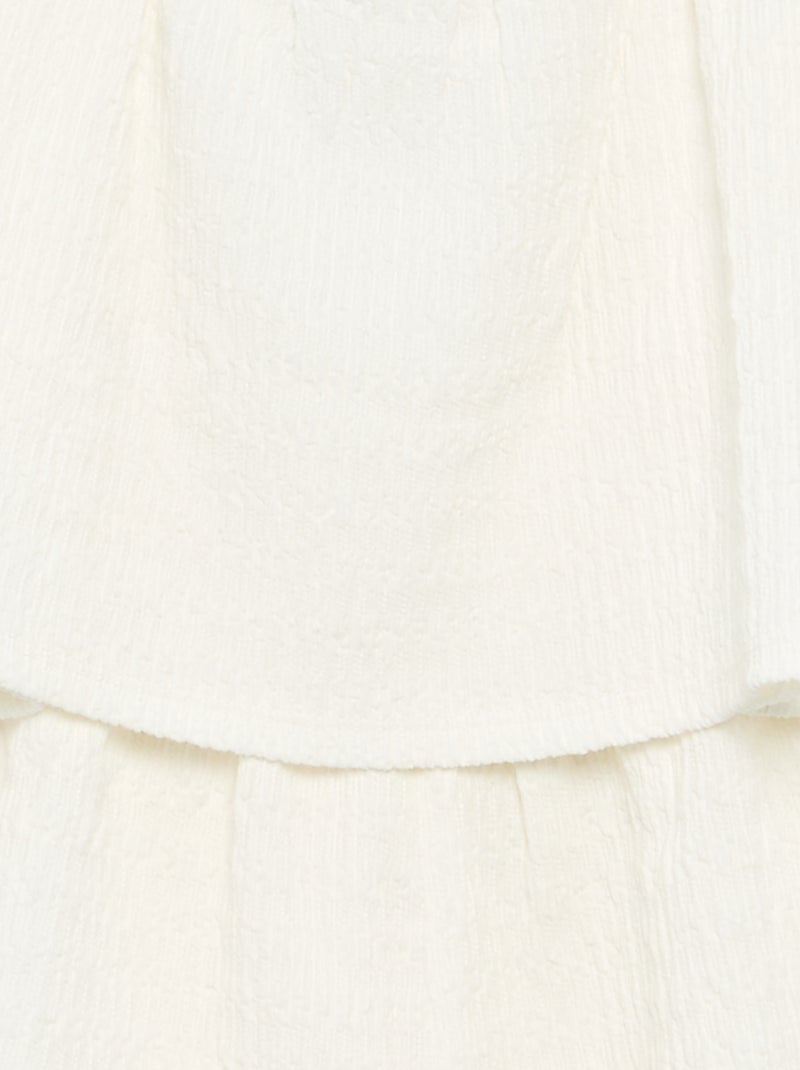 Tuta corta a tinta unita con spalline in maglia a nido d'ape Bianco - Kiabi