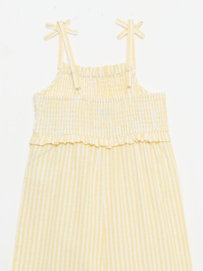 Tuta pantalone con bretelle Giallo - Kiabi