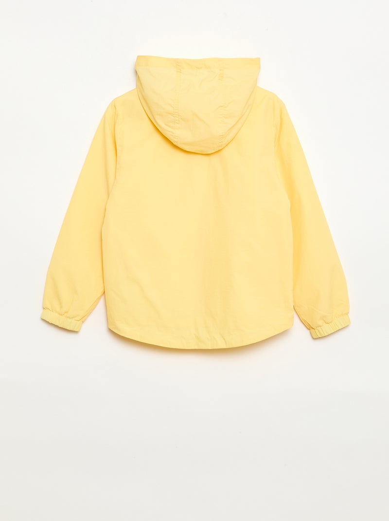 Unifarbene Windjacke, die sich in der Kapuze verstauen lässt GELB - Kiabi
