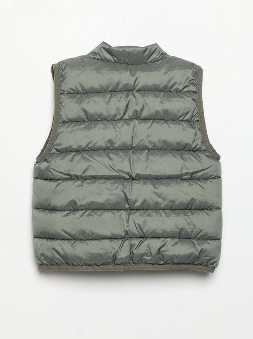 Veste matelassée unie sans manches - Kiabi Veste matelassée unie sans manches - Kiabi