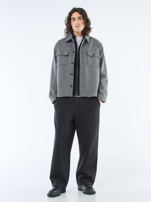 Warme Strickjacke mit Stehkragen und Reissverschluss - Kiabi Warme Strickjacke mit Stehkragen und Reissverschluss - Kiabi
