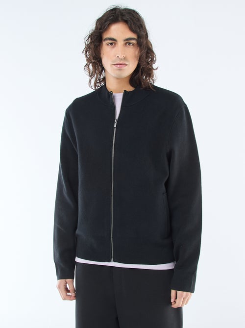 Warme Strickjacke mit Stehkragen und Reissverschluss - Kiabi Warme Strickjacke mit Stehkragen und Reissverschluss - Kiabi