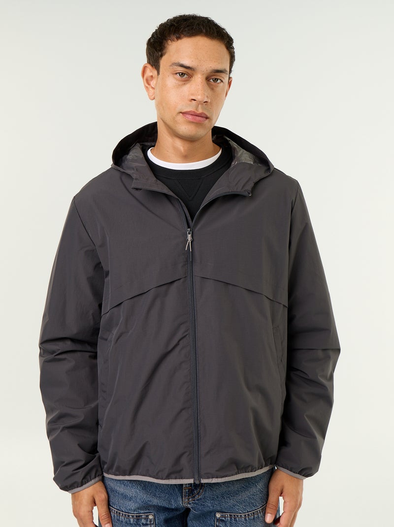 Wasserabweisende Kapuzen-Windjacke Noir - Kiabi