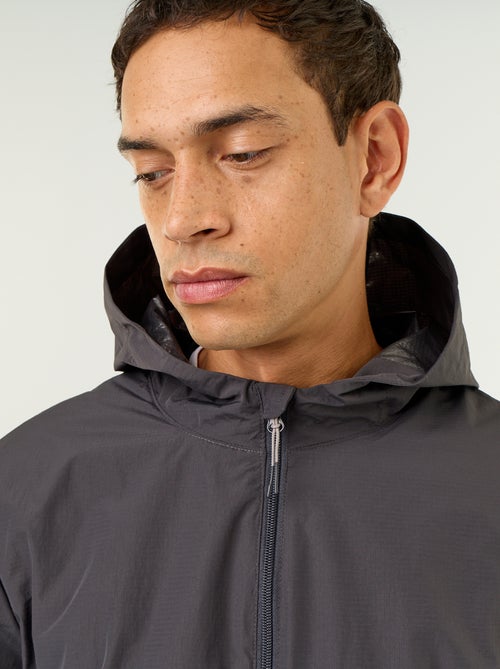 Wasserabweisende Kapuzen-Windjacke - Kiabi