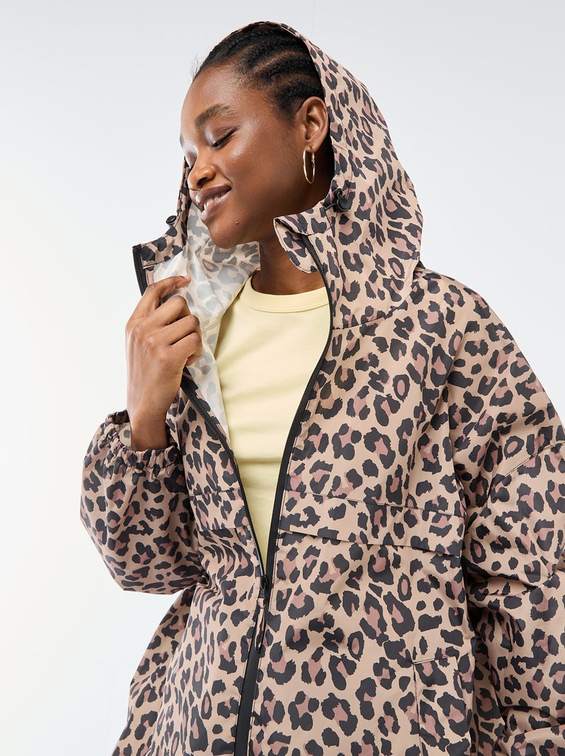 Wasserabweisender Regencape mit Kapuze und praktischer Faltfunktion Beige - Kiabi