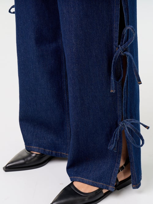 Wide-leg jeans with decorative ties at the hem - Kiabi Wide-leg jeans with decorative ties at the hem - Kiabi