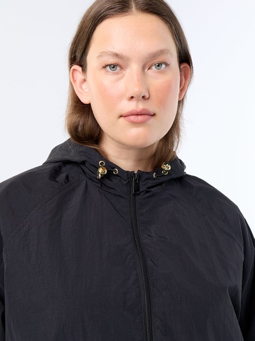 Windjacke mit goldenen Details - Kiabi Windjacke mit goldenen Details - Kiabi