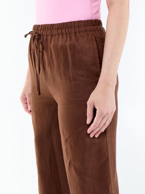Women's wide-leg trousers in 100% linen - Kiabi Women's wide-leg trousers in 100% linen - Kiabi